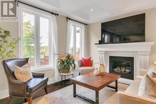 75 Ashbourne Drive, Toronto, ON - Indoor Photo Showing Living Room With Fireplace