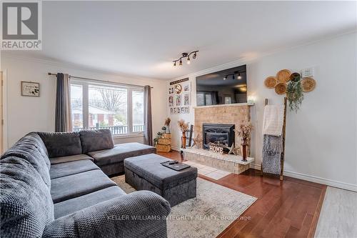 2402 Edgar Street, Stormont, Dundas And Glengarry, ON - Indoor Photo Showing Living Room With Fireplace