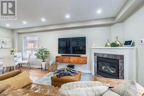 32 Solmar Avenue, Whitby, ON - Indoor Photo Showing Living Room With Fireplace