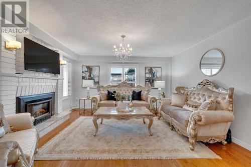 47 Stratton Crescent, Whitby, ON - Indoor Photo Showing Living Room With Fireplace