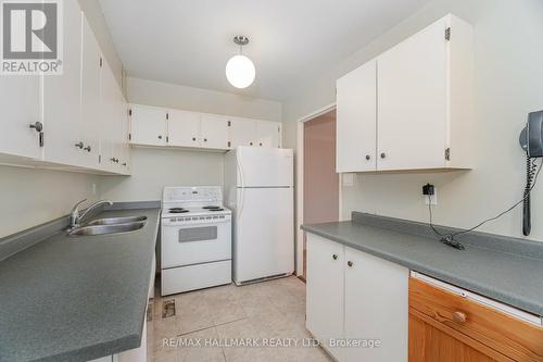 412 - 70 Baif Boulevard, Richmond Hill, ON - Indoor Photo Showing Kitchen With Double Sink