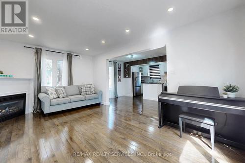 33 Hazelglen Court, Brampton, ON - Indoor Photo Showing Living Room With Fireplace