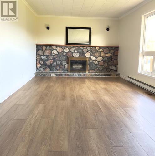 15 Dawson Drive, Pasadena, NL - Indoor Photo Showing Other Room With Fireplace