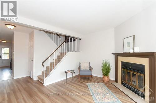 32 Buckingham Pvt, Ottawa, ON - Indoor Photo Showing Living Room With Fireplace