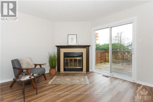 32 Buckingham Pvt, Ottawa, ON - Indoor Photo Showing Living Room With Fireplace