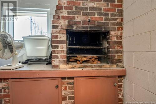 3238 Rte. 475, Bouctouche, NB - Indoor Photo Showing Other Room With Fireplace