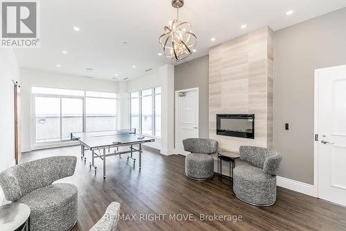 Ph605 - 80 Orchard Point Road, Orillia, ON - Indoor Photo Showing Living Room With Fireplace