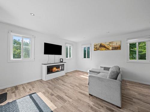 Living room - 90 Rue Jean, Drummondville, QC - Indoor Photo Showing Living Room With Fireplace