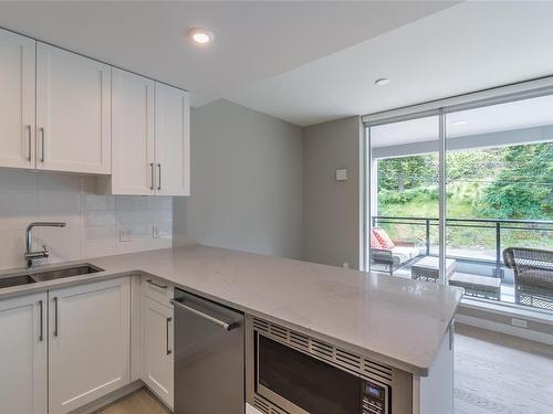 307-3529 Dolphin Dr, Nanoose Bay, BC - Indoor Photo Showing Kitchen With Double Sink