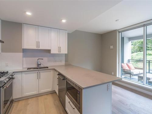 307-3529 Dolphin Dr, Nanoose Bay, BC - Indoor Photo Showing Kitchen With Double Sink