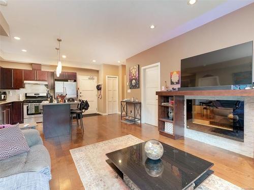 305-6591 Lincroft Rd, Sooke, BC - Indoor Photo Showing Living Room With Fireplace