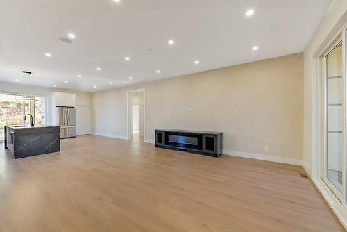 5084 Twinflower Crescent, Kelowna, BC - Indoor Photo Showing Living Room With Fireplace