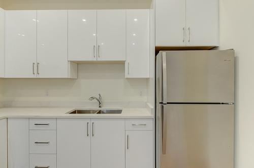 5084 Twinflower Crescent, Kelowna, BC - Indoor Photo Showing Kitchen With Double Sink