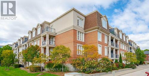 306 - 4620 Highway 7, Vaughan, ON - Outdoor With Balcony With Facade