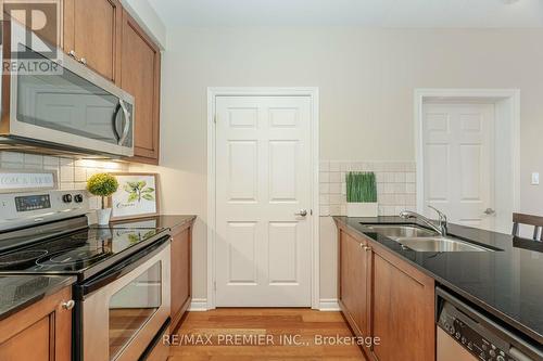 306 - 4620 Highway 7, Vaughan, ON - Indoor Photo Showing Kitchen With Stainless Steel Kitchen With Double Sink