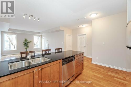 306 - 4620 Highway 7, Vaughan, ON - Indoor Photo Showing Kitchen With Double Sink