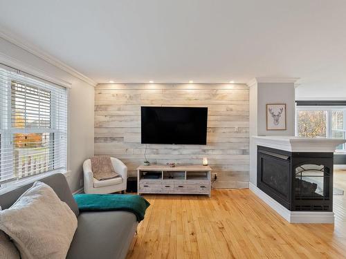 Living room - 73 Rue Donaldson, Shannon, QC - Indoor Photo Showing Living Room With Fireplace