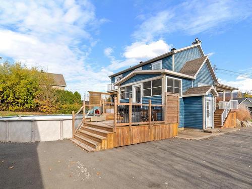 Back facade - 73 Rue Donaldson, Shannon, QC - Outdoor With Above Ground Pool