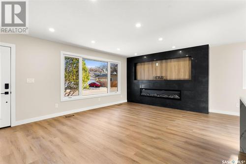 4206 Pasqua Street, Regina, SK - Indoor Photo Showing Living Room With Fireplace