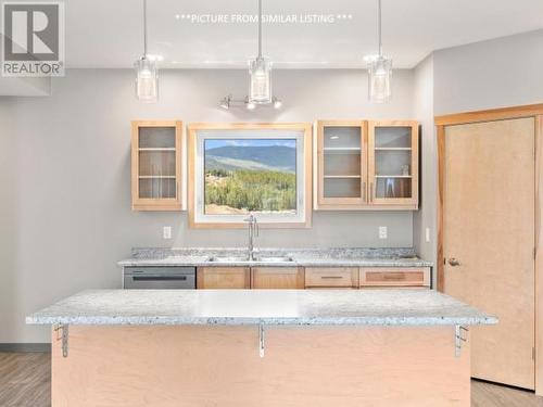 16 Flora Avenue, Whitehorse, YT - Indoor Photo Showing Kitchen With Double Sink