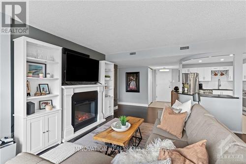 705 - 200 Lafontaine Avenue, Ottawa, ON - Indoor Photo Showing Living Room With Fireplace