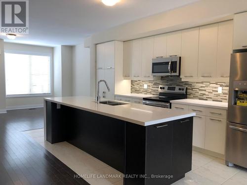 9 Mcgurran Lane, Richmond Hill, ON - Indoor Photo Showing Kitchen With Stainless Steel Kitchen With Double Sink With Upgraded Kitchen