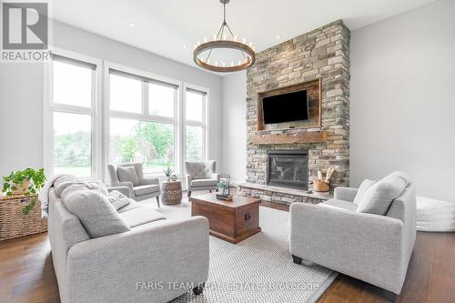 141 Dale Crescent, Bradford West Gwillimbury, ON - Indoor Photo Showing Living Room With Fireplace