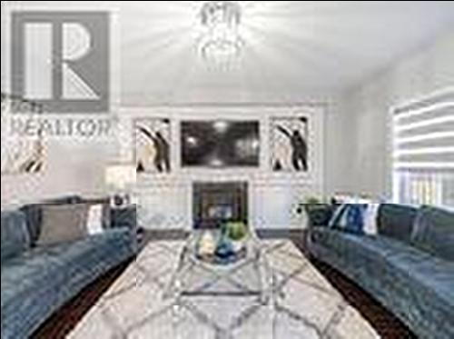 7 Odeon Street, Brampton, ON - Indoor Photo Showing Living Room With Fireplace