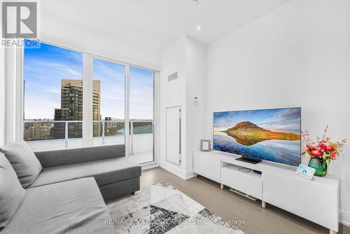 2806 - 20 Shore Breeze Drive, Toronto, ON - Indoor Photo Showing Living Room