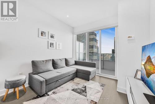 2806 - 20 Shore Breeze Drive, Toronto, ON - Indoor Photo Showing Living Room