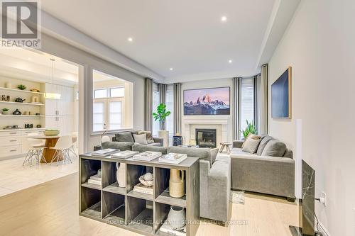 83 Ballmer Trail, Oakville, ON - Indoor Photo Showing Living Room With Fireplace