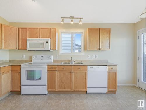 3344 24 Av Nw, Edmonton, AB - Indoor Photo Showing Kitchen With Double Sink