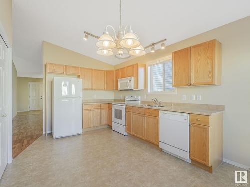 3344 24 Av Nw, Edmonton, AB - Indoor Photo Showing Kitchen With Double Sink