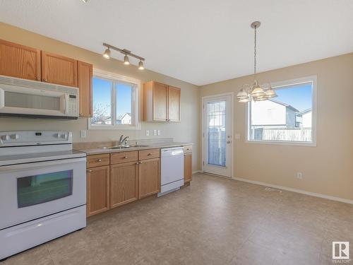 3344 24 Av Nw, Edmonton, AB - Indoor Photo Showing Kitchen With Double Sink