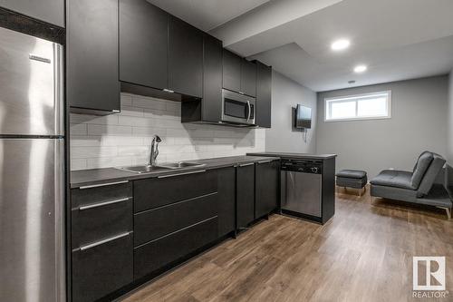 8538 Cushing Pl Sw, Edmonton, AB - Indoor Photo Showing Kitchen With Double Sink With Upgraded Kitchen