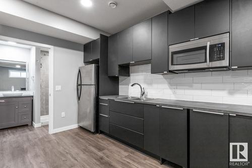 8538 Cushing Pl Sw, Edmonton, AB - Indoor Photo Showing Kitchen With Double Sink With Upgraded Kitchen