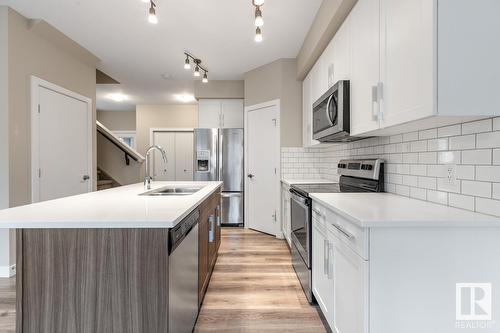 8538 Cushing Pl Sw, Edmonton, AB - Indoor Photo Showing Kitchen With Double Sink With Upgraded Kitchen