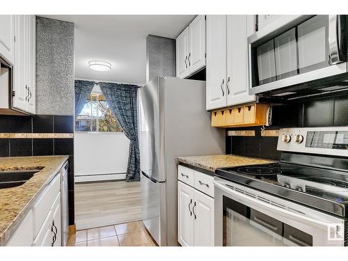 #5 10836 116 St Nw, Edmonton, AB - Indoor Photo Showing Kitchen With Double Sink