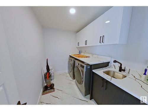 5806 Peltier Close, Beaumont, AB - Indoor Photo Showing Laundry Room