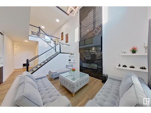 5806 Peltier Close, Beaumont, AB - Indoor Photo Showing Living Room With Fireplace