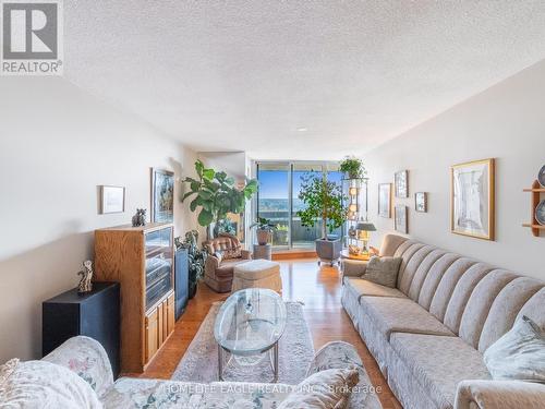 1904 - 3131 Bridletowne Circle, Toronto, ON - Indoor Photo Showing Living Room