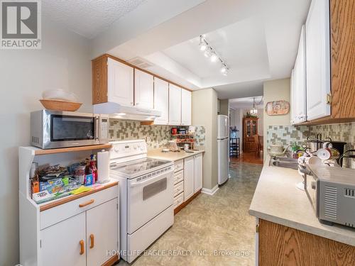 1904 - 3131 Bridletowne Circle, Toronto, ON - Indoor Photo Showing Kitchen With Double Sink