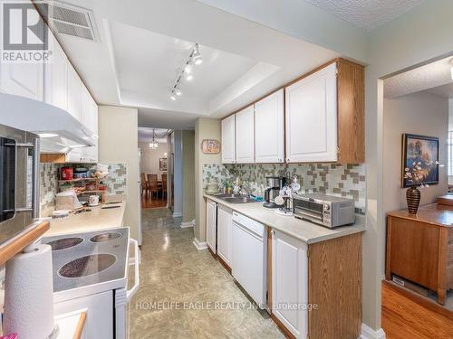 1904 - 3131 Bridletowne Circle, Toronto, ON - Indoor Photo Showing Kitchen With Double Sink