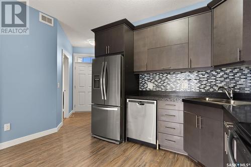 4181 Green Apple Drive E, Regina, SK - Indoor Photo Showing Kitchen With Stainless Steel Kitchen With Double Sink