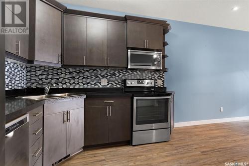 4181 Green Apple Drive E, Regina, SK - Indoor Photo Showing Kitchen With Stainless Steel Kitchen With Double Sink With Upgraded Kitchen