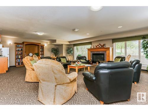 #216 261 Youville E Nw, Edmonton, AB - Indoor With Fireplace