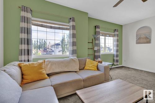 716 78 St Sw, Edmonton, AB - Indoor Photo Showing Living Room