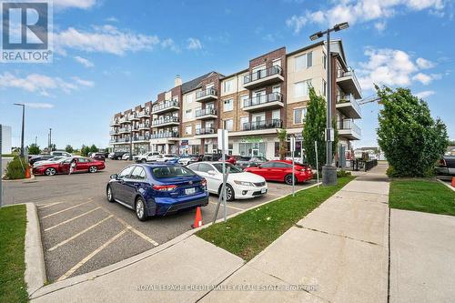 211 - 50 Sky Harbour Drive, Brampton, ON - Outdoor With Balcony With Facade