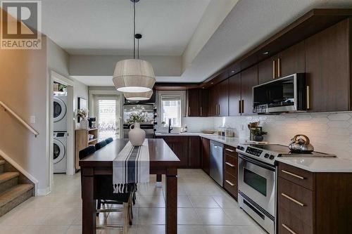 134 West Springs Road Sw, Calgary, AB - Indoor Photo Showing Kitchen With Upgraded Kitchen