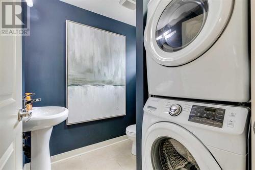 134 West Springs Road Sw, Calgary, AB - Indoor Photo Showing Laundry Room